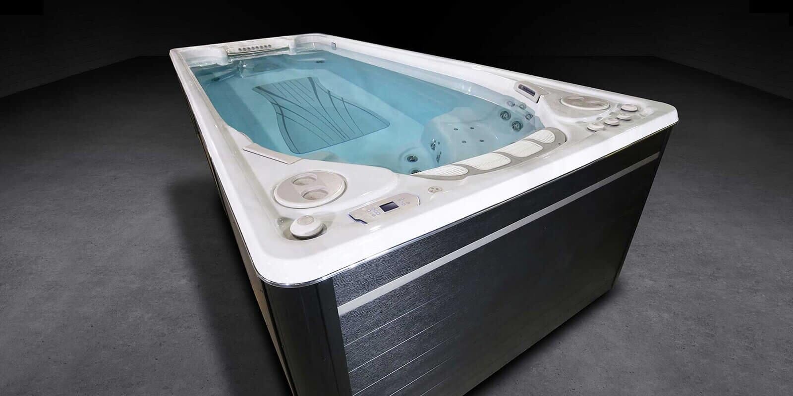 Hydropool Executive Trainer swim spa on a backyard deck